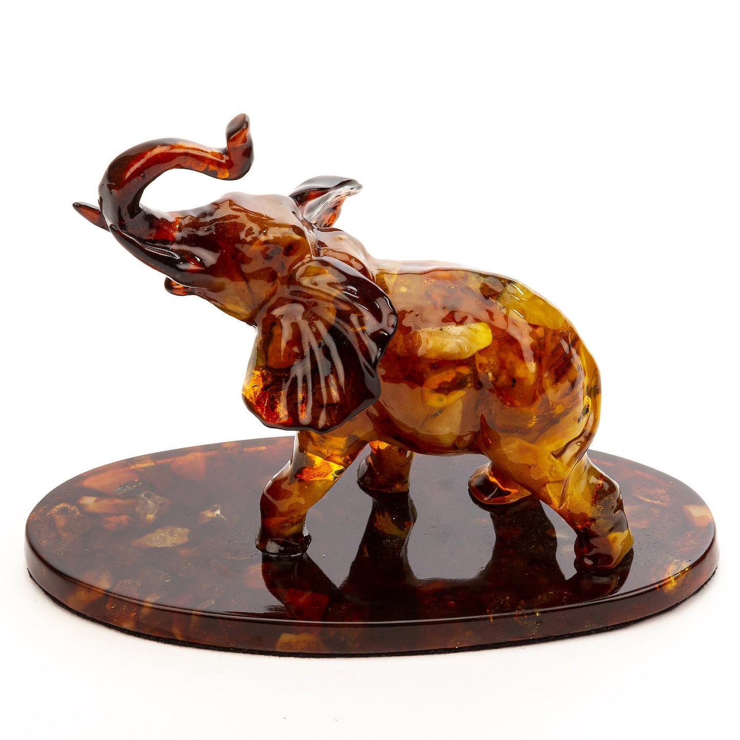 Large amber elephant with raised trunk |symbol of well being and prosperity |Home Decor| Amber Sculpture Souvenir |Amber Elephant Statuette