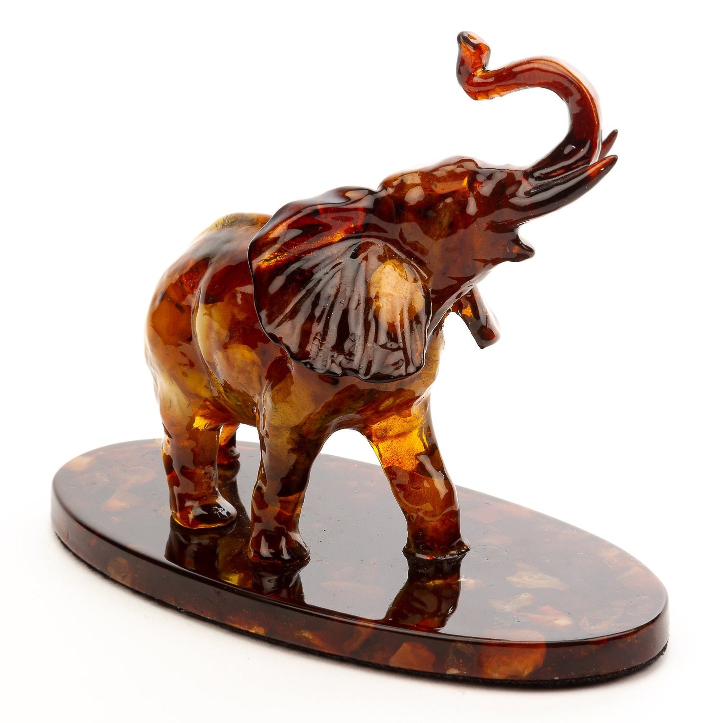 Large amber elephant with raised trunk |symbol of well being and prosperity |Home Decor| Amber Sculpture Souvenir |Amber Elephant Statuette