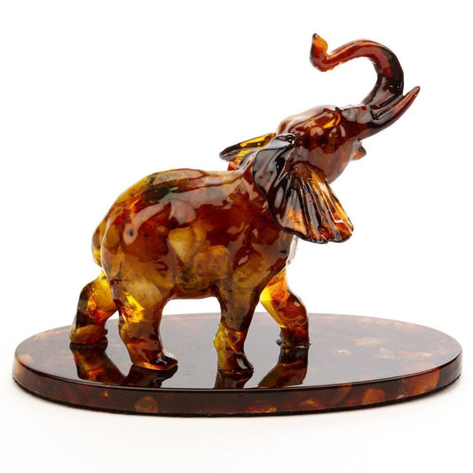 Large amber elephant with raised trunk |symbol of well being and prosperity |Home Decor| Amber Sculpture Souvenir |Amber Elephant Statuette